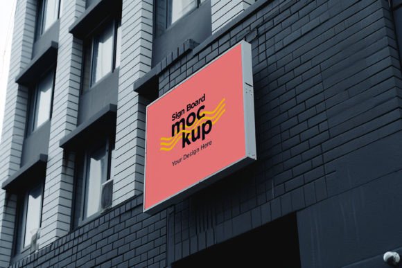 Download Sign Board Mockup on Building Wall - Premium Resources
